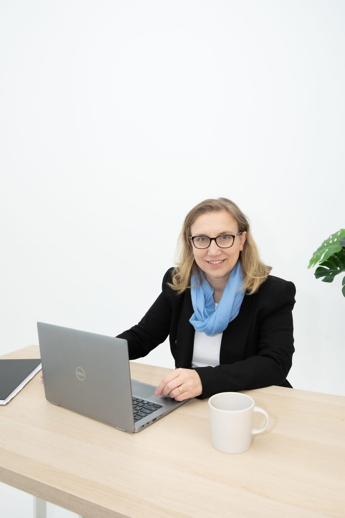 Ela from EA Accounting Solutions working through a client's figures
